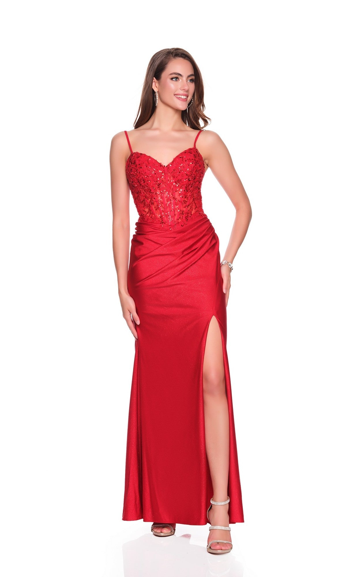 A woman wears the Dave and Johnny 12880 long prom dress with a sleeveless sequin corset bodice, sweetheart neckline, thigh-high slit, and lace-up back, standing against a white background.